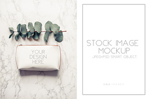 Clutch Mockup With Eucalyptus.