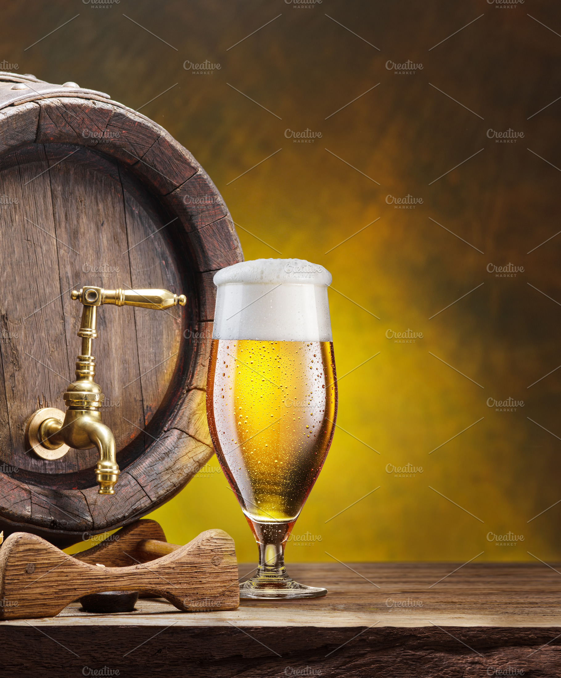 Glass goblet of chilled beer, a Food & Drink Photo by Volff
