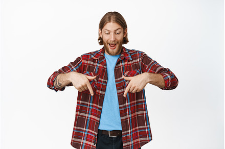 Excited and amazed blond adult man, a Person Photo by Cookie Studio