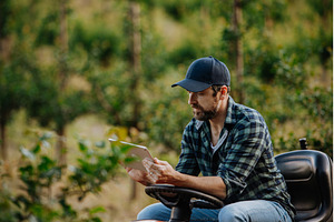 Farmer using digital tablet to, a Nature Photo by HalfPoint