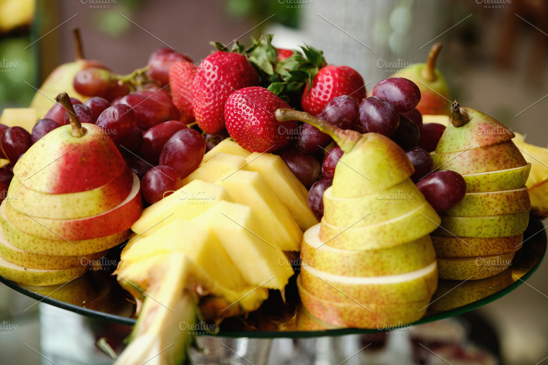 Elegant Fruit Platter with Strawberries, Grapes, Sliced Pears, and Pineapple., a Food & Drink Photo by Rohan Photography