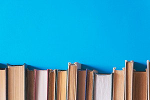 Old books on a blue background