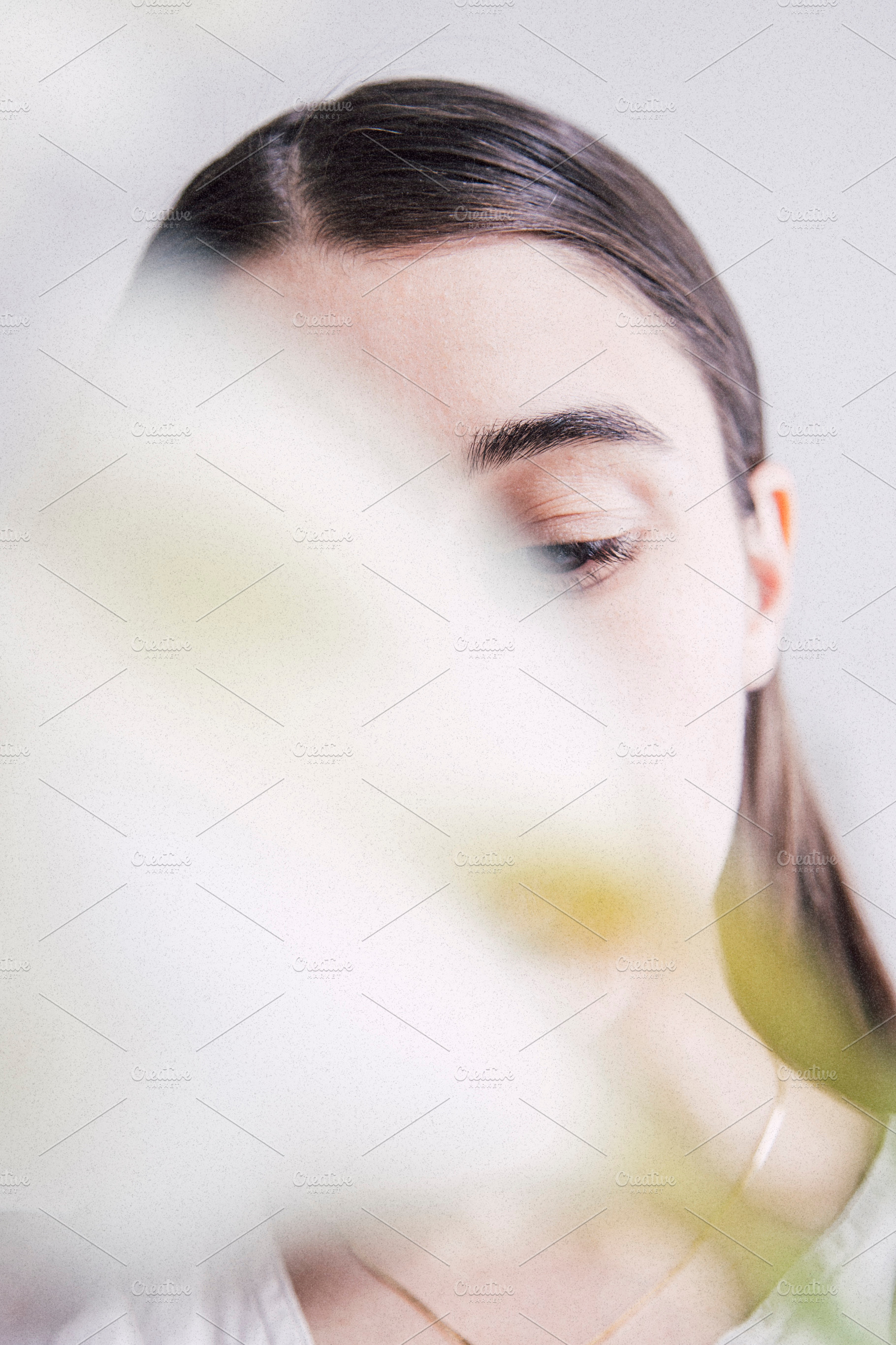 Portrait of a girl with flower stock photo containing summer and linen, a Beauty & Fashion Photo by Mukuko Studio
