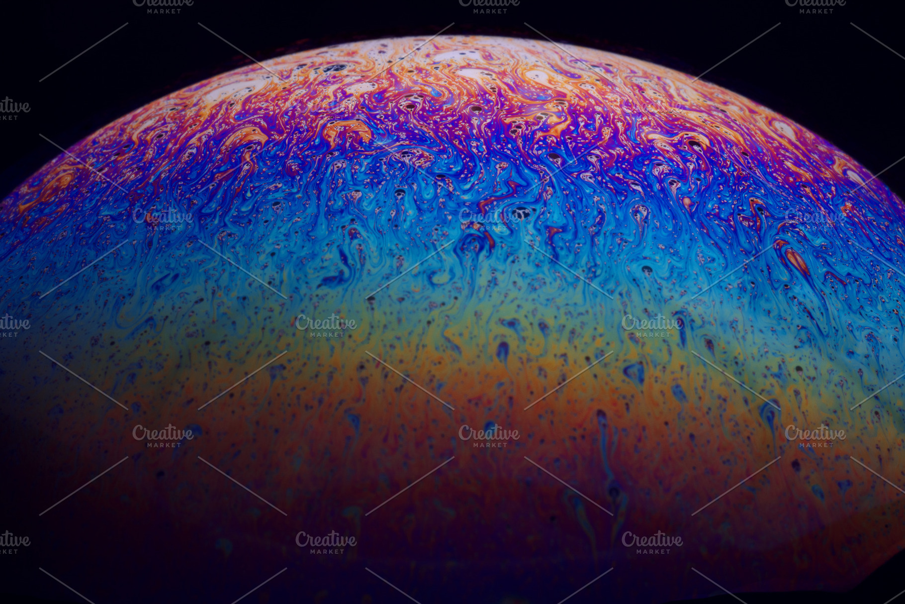 Abstract close-up of a vibrant soap bubble surface showing swirl, a Background Photo by Ales Munt
