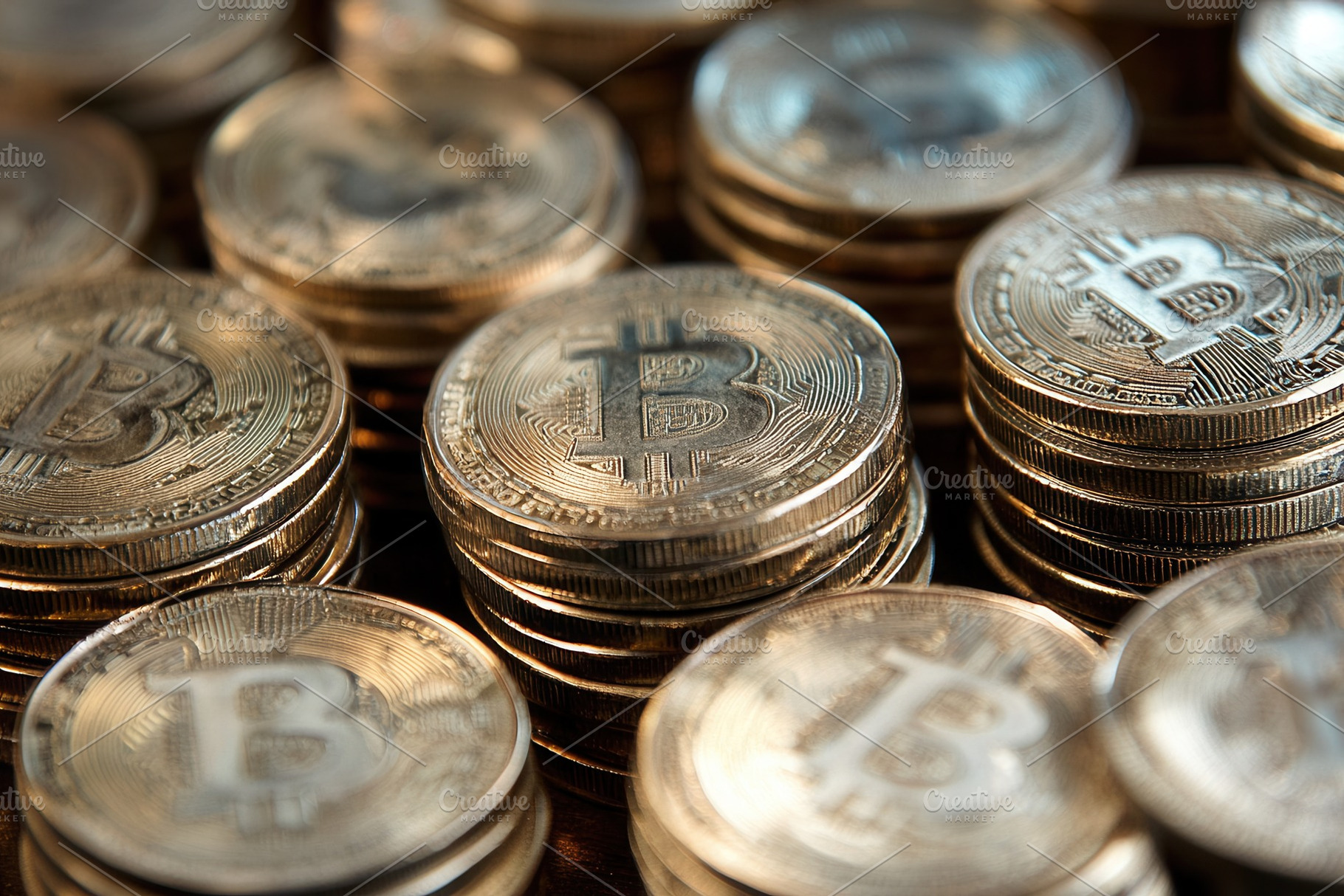 View of numerous shiny Bitcoin coins, a Photo by Pavel_design