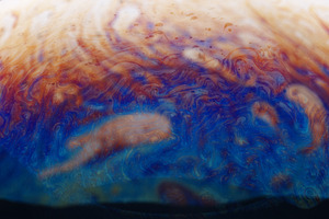 Colorful abstract pattern with swirling blue, red and orange liq, a Background Photo by Ales Munt