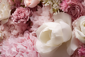 Soft pink and white floral wall decor creating a romantic backgr, a Photo by Studio ANNA
