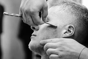portrait of a young man getting ready at a barbershop, a Person Photo by Weddings, People, Travel