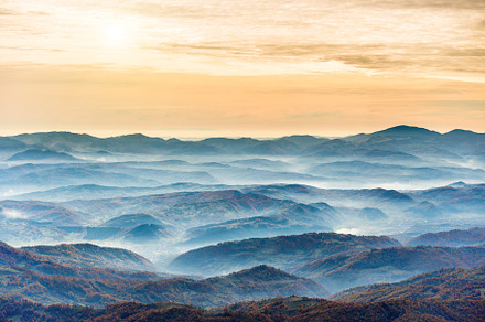 Sunset in the mountains stock photo containing sunset and mountain, a Nature Photo by Vapi
