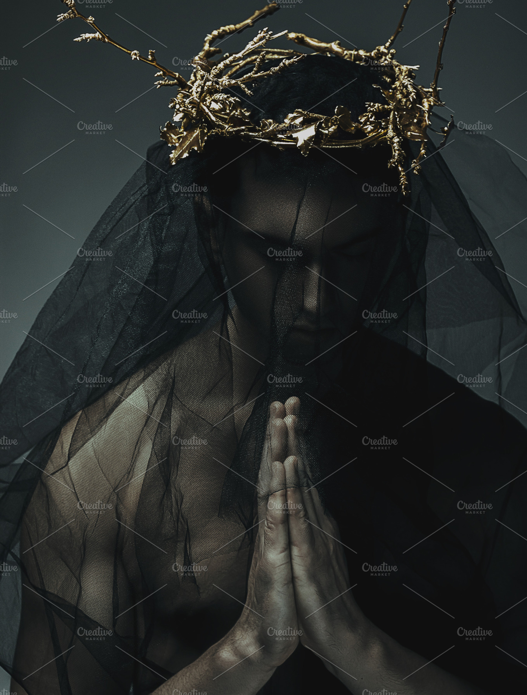 Man in black cloth and a gold crown containing imposing, caucasian, and, a Beauty & Fashion Photo by Slava Samoilenko