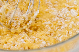Culinary work whisking dough yellow liquid bowl, a Food & Drink Photo by Photo Drive Studio