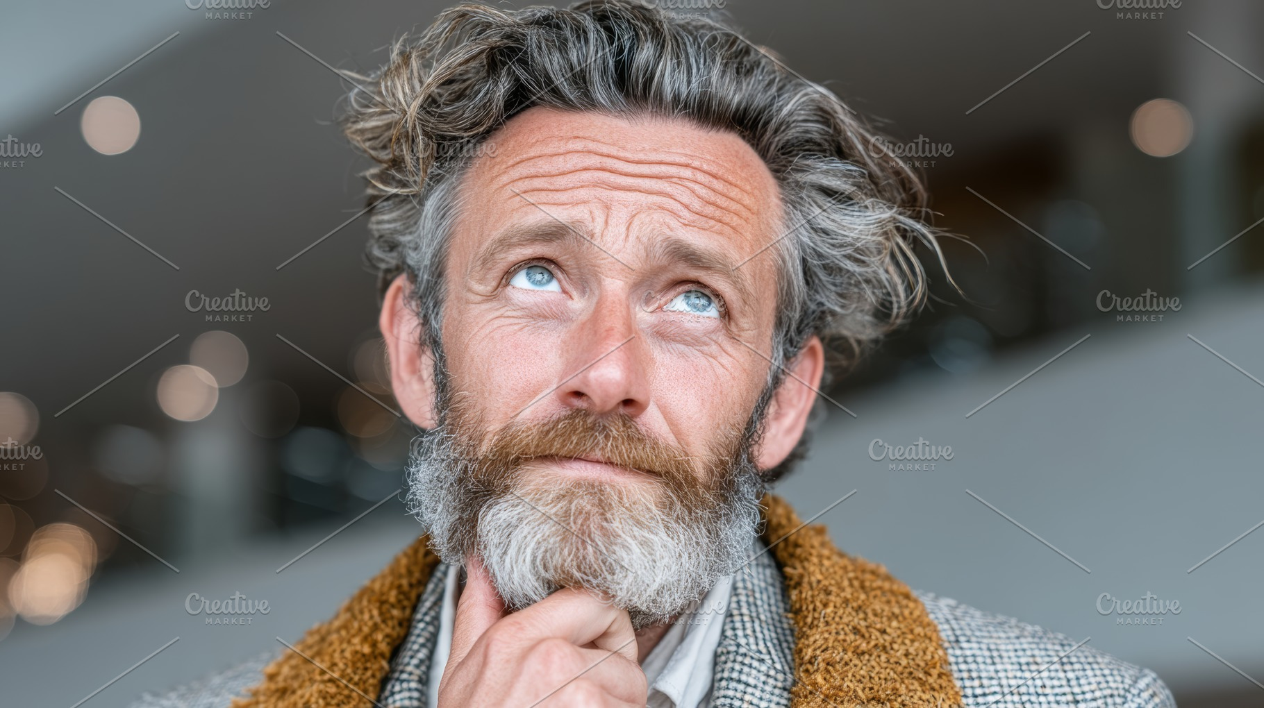 Thoughtful man with beard pondering in a bright indoor setting, a Person Photo by AS photostudio