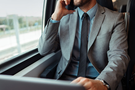 Businessman in fast train, a Transportation Photo by REDDOT Studio