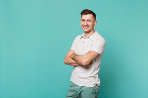 Portrait of handsome young man in ca containing background, isolated, and