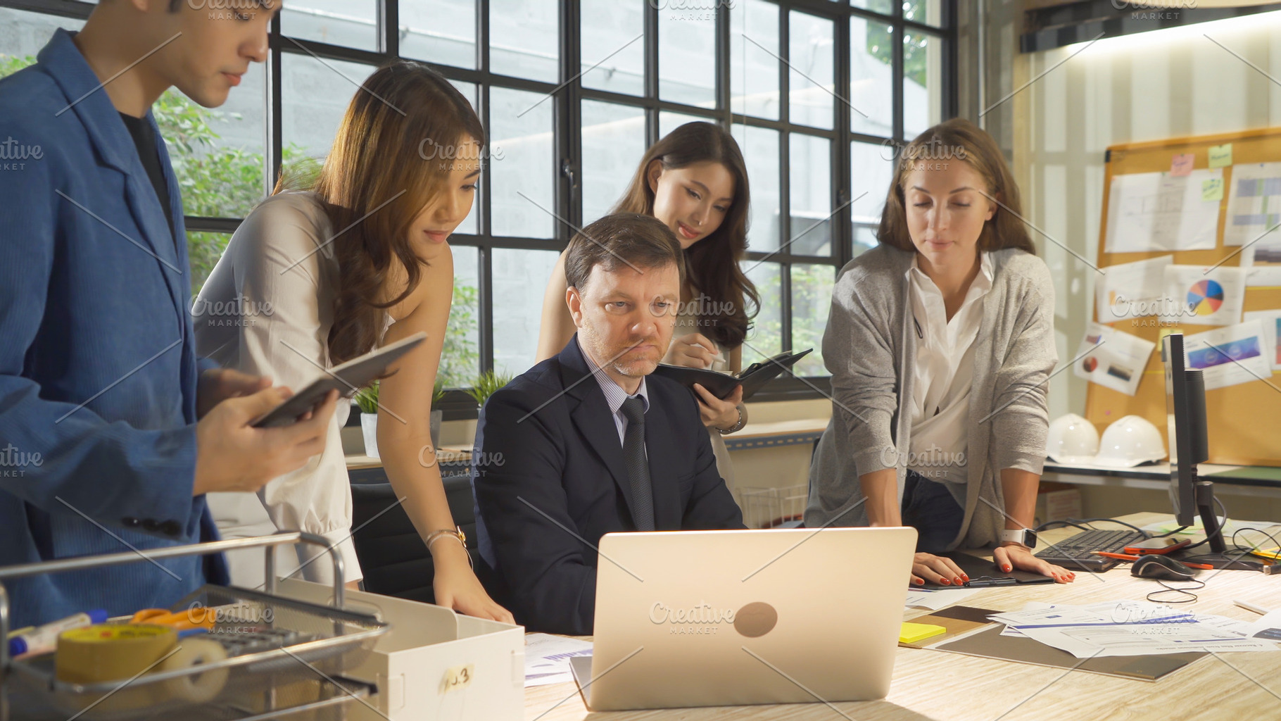 A group of multi ethnic business team talk, communicate, discuss, a Photo by Tampatra
