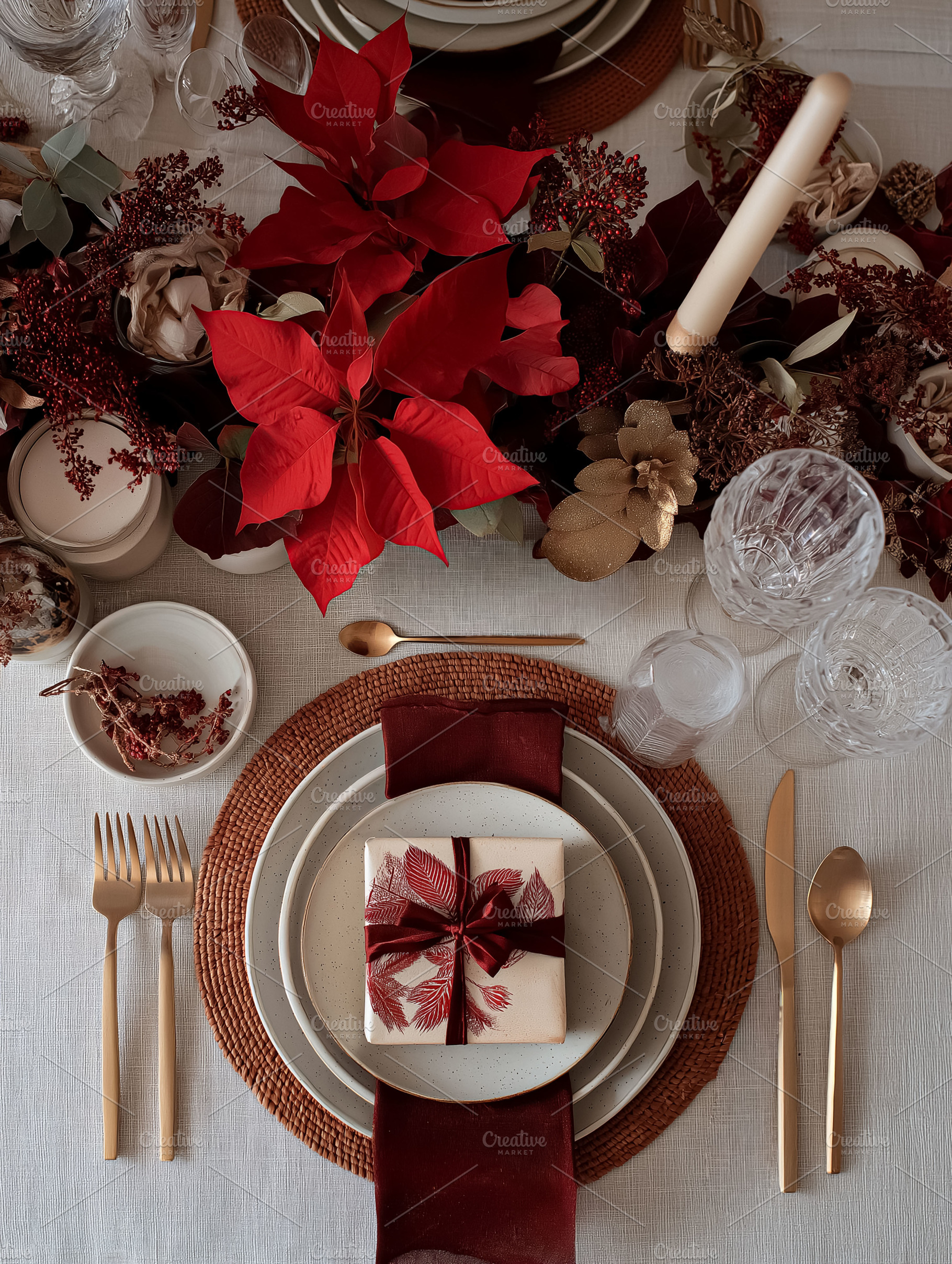 Christmas holiday table setting with festive poinsettias, golden cutlery, and a, a Food & Drink Photo by Anneleven