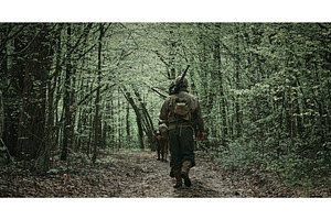 Soldier Walking on a Forest Path in, a Person Photo by Our Amazing World