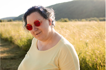 The joyful young woman in sunglasses, a Person Photo by oksix