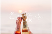Clinking moscato bottles on a beach, a Food & Drink Photo by Beach Babe Stock (Thumbnail 2 of 2)