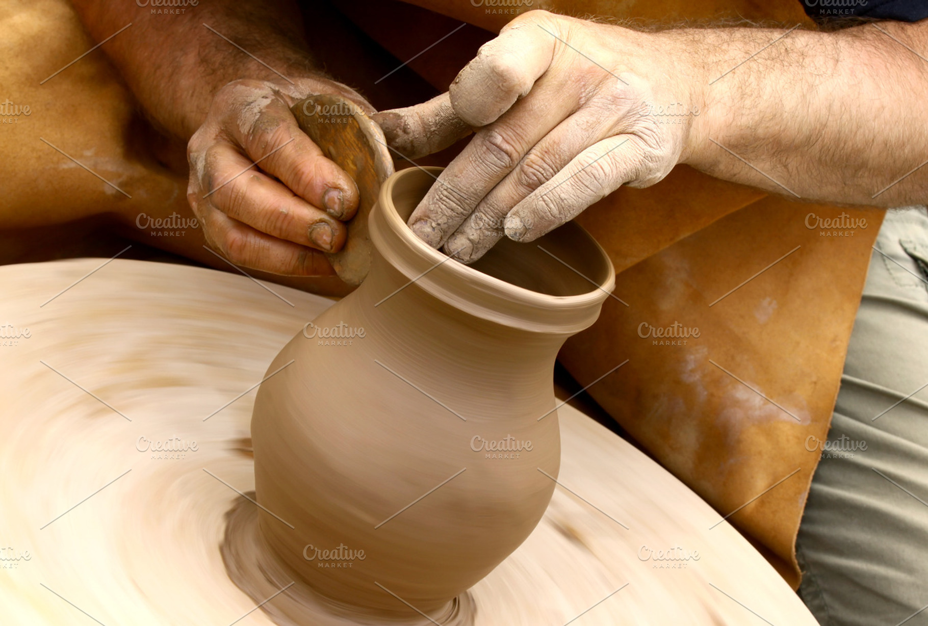 Potter making clay jug, a Person Photo by BOOCYS