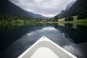 Front of paddle boat at beautiful featuring boat, water, and ontario