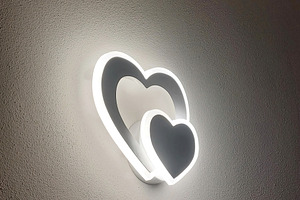 Heart shaped led wall lamp illuminating a textured wall, an Architecture Photo by Antonio Gravante Market
