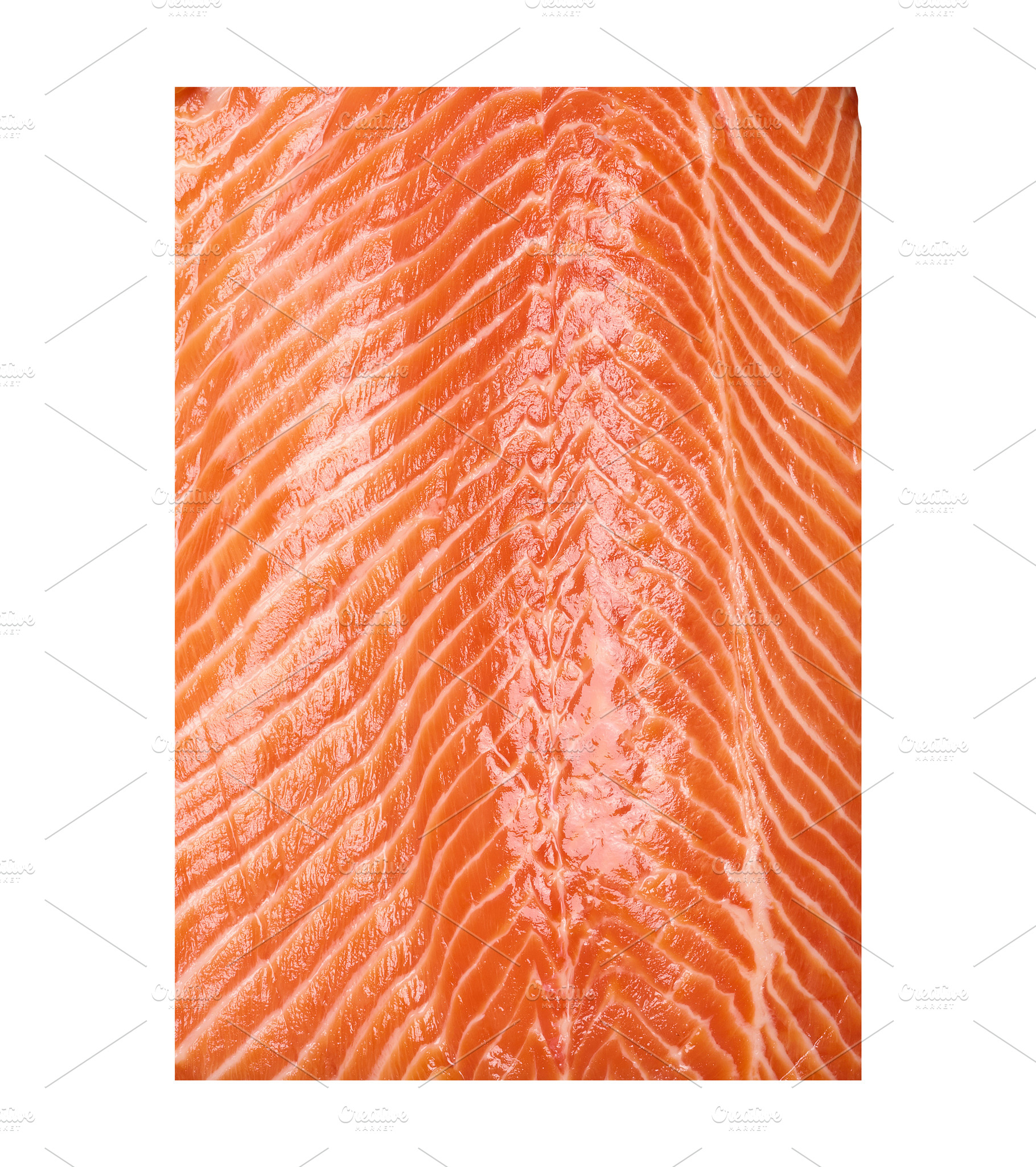 Close-up texture of fresh red salmon fish fillet on isolated bac, a Food & Drink Photo by ndanko