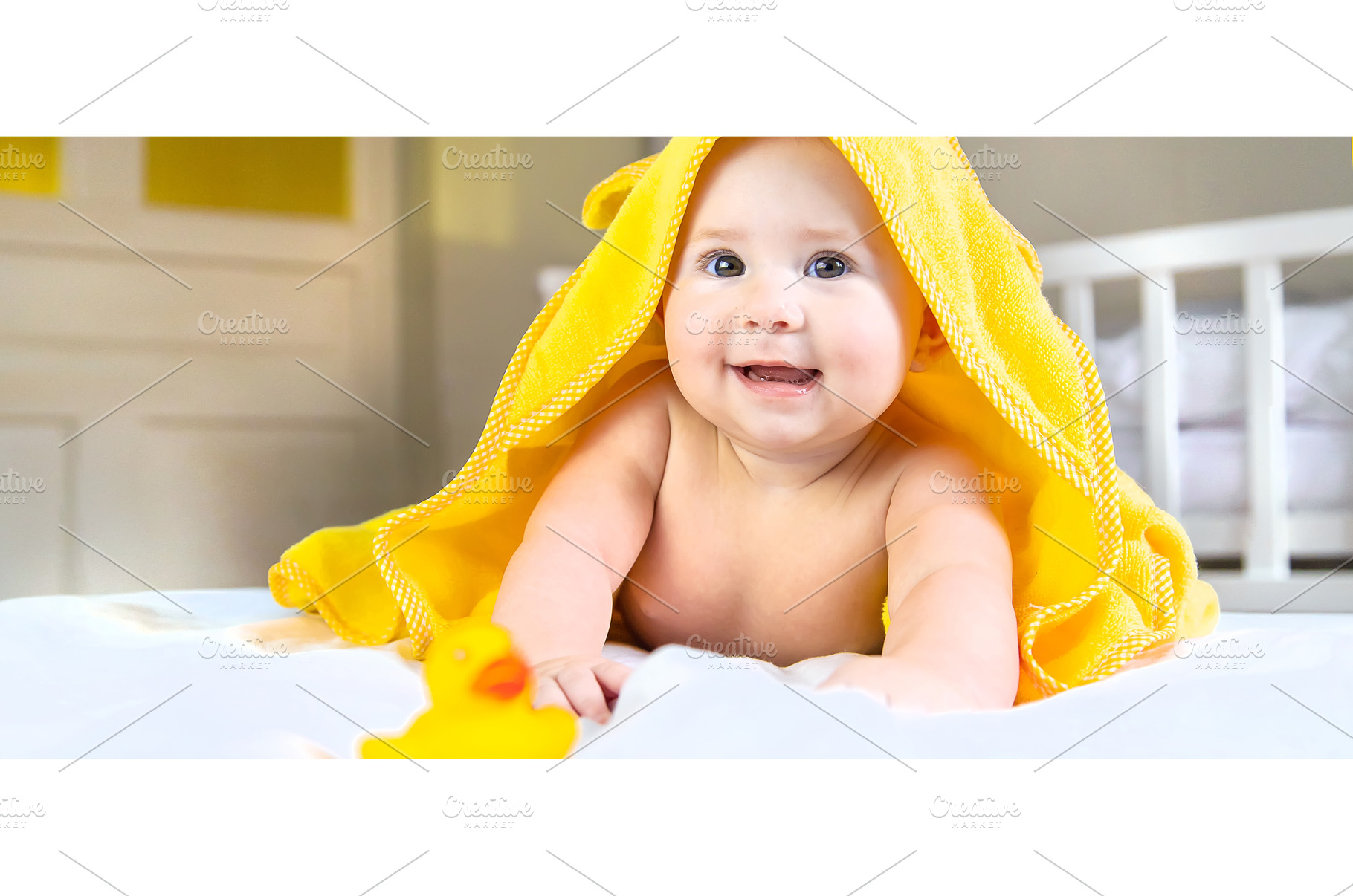 Baby after bathing in a towel, a Person Photo by yanadjana