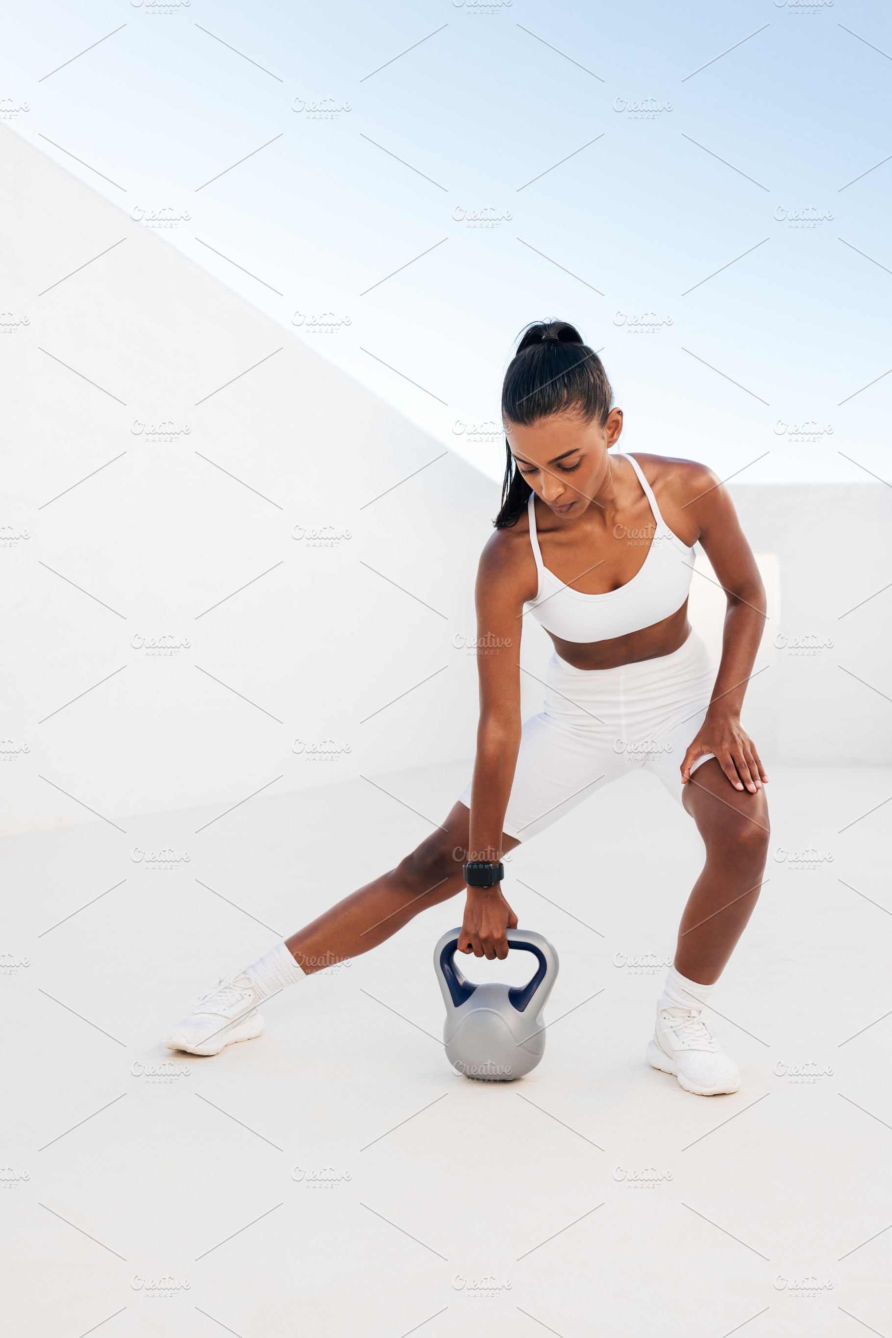 Young fit female doing a workout, a Sports & Recreation Photo by Artem Varnitsin