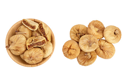 dried fig in wooden bowl isolated on, a Food & Drink Photo by NataPhoto
