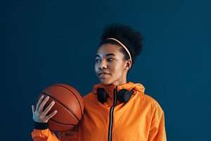 Young female with basketball, a Sports & Recreation Photo by Artem Varnitsin