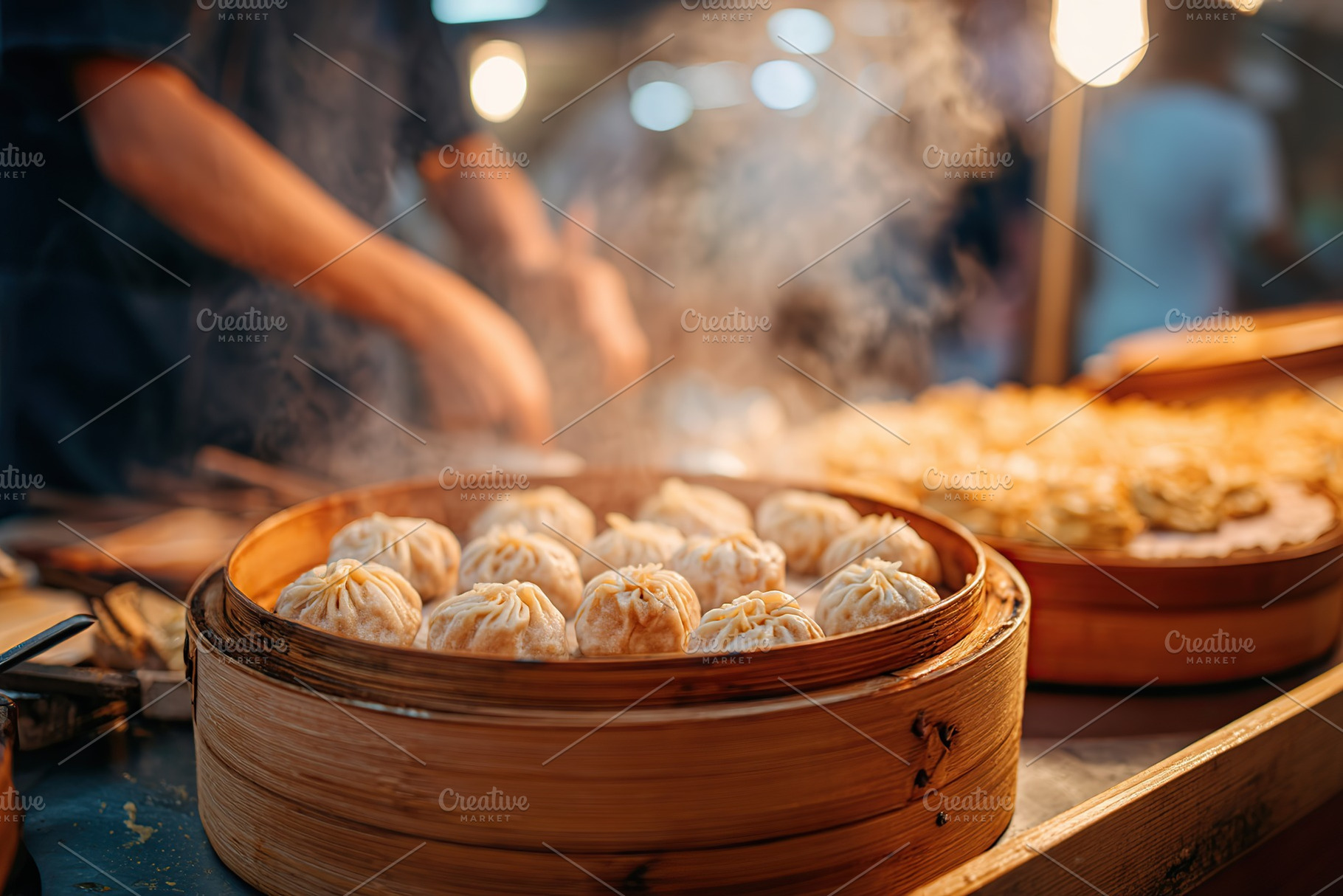 Steamed dumplings in bamboo baskets at a bustling food market in evening lights, a Food & Drink Photo by AlyaAnd