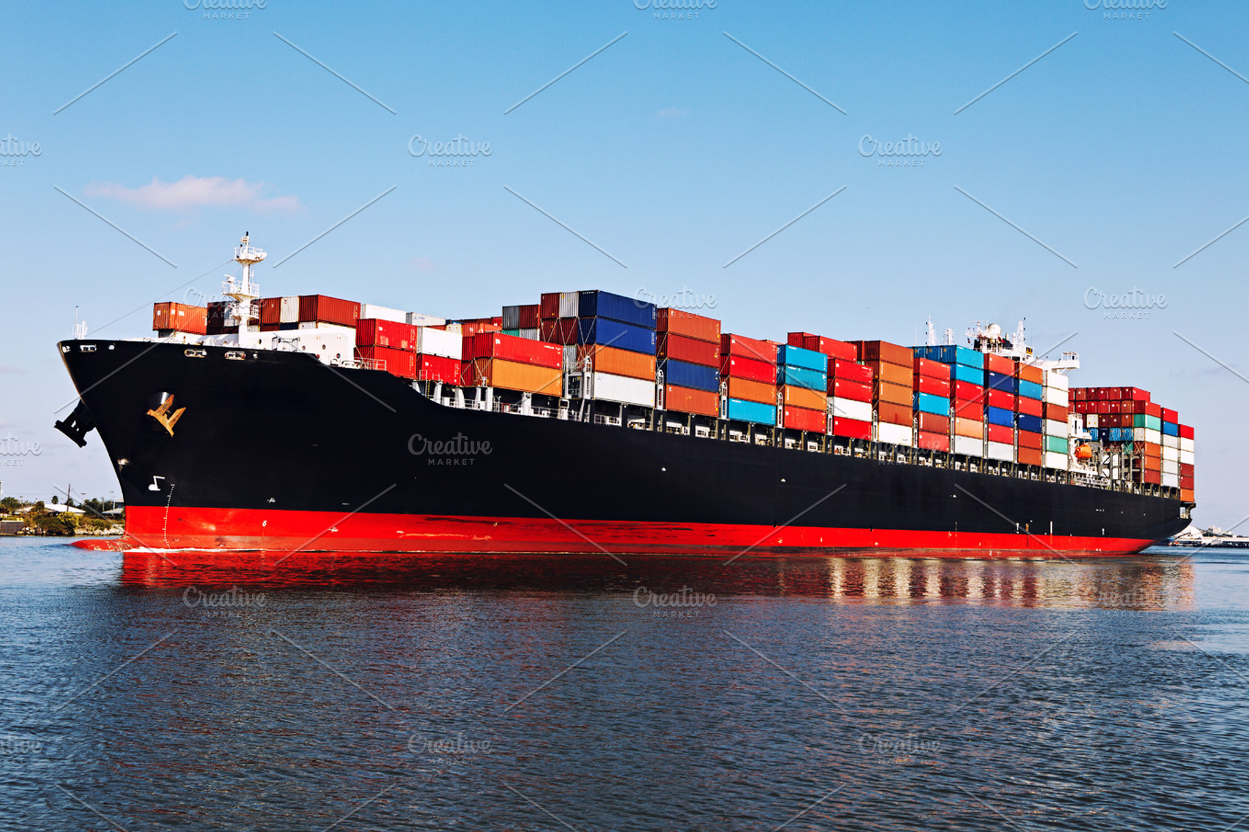 Cargo containing boat, cargo, and carrier, a Transportation Photo by khoroshkov