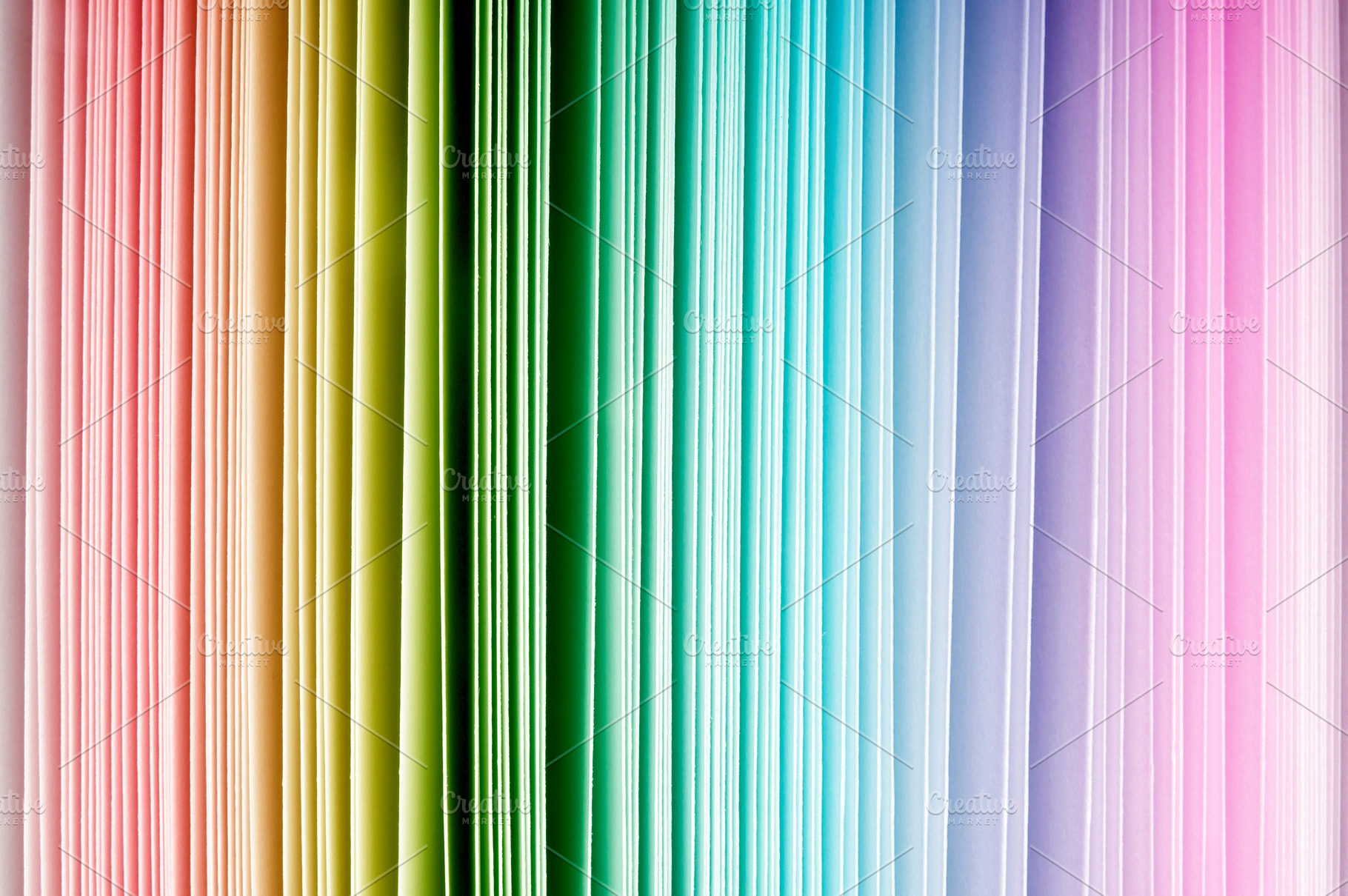 Rainbow Coloured Paper Background, a Background Photo by THP Creative