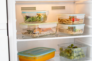 Organized refrigerator filled with healthy food and meal prep containers