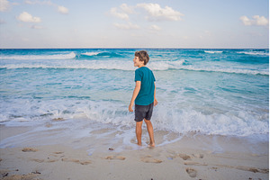 Teenage boy running on the sandy, a Sports & Recreation Photo by Elizaveta Galitskaya