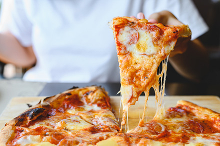 Wood fire cheesy pizza slice in hand. Traditional Hawaiian and S, a Food & Drink Photo by Ministocker