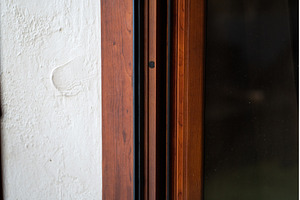 Wooden window frame with a rich, an Architecture Photo by volodymyrshtun13795