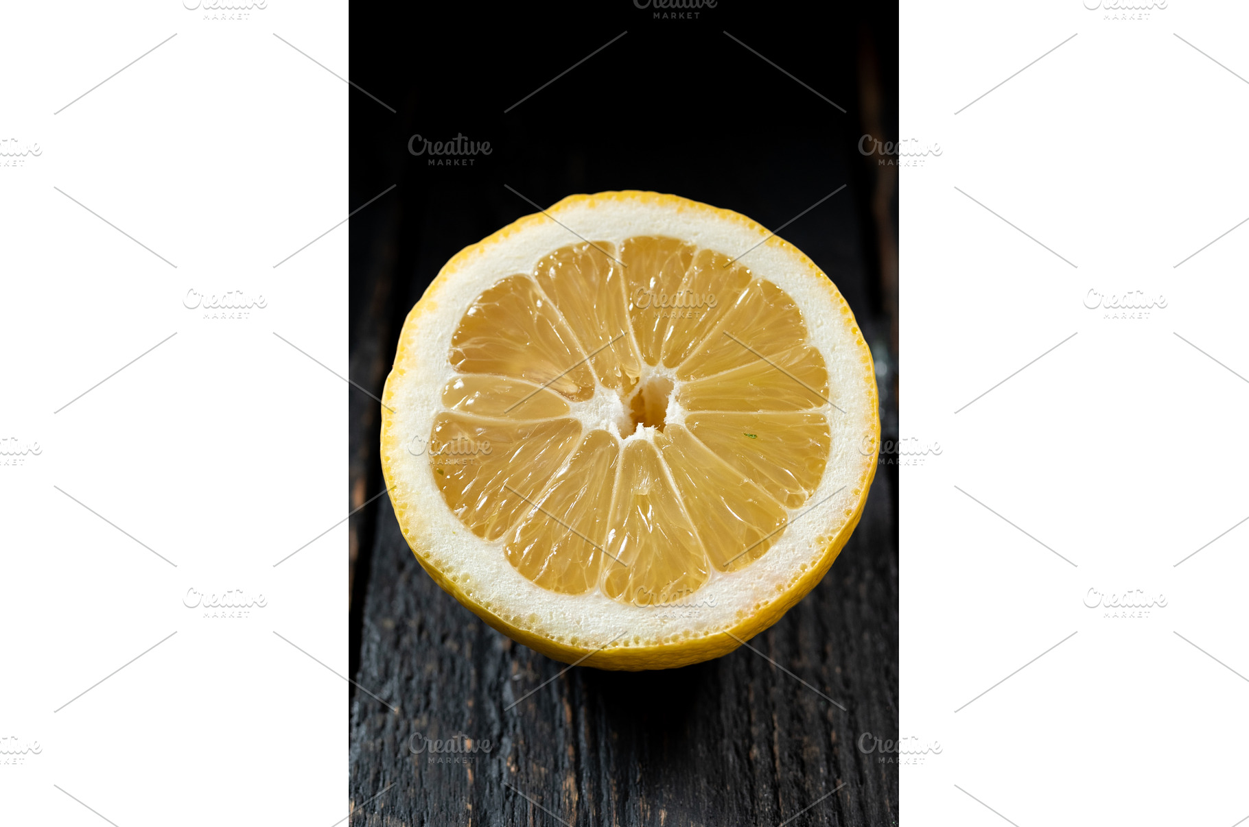Macro photo of a sliced lemon on a, a Food & Drink Photo by Stockphoto by vzwer