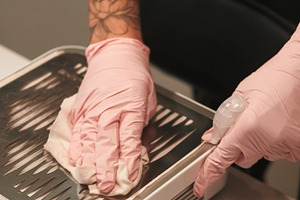 Beauty salon disinfection surfaces, a Person Photo by Photo Drive Studio