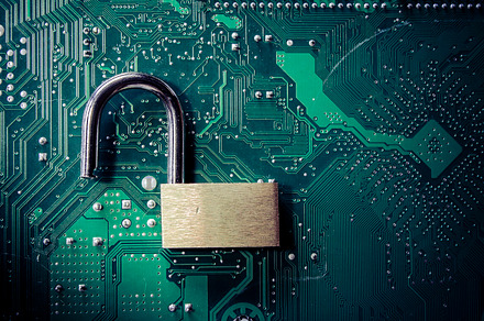 Open padlock and motherboard