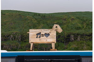 Wooden childs toy shaped like a, an Architecture Photo by Backyard Stock