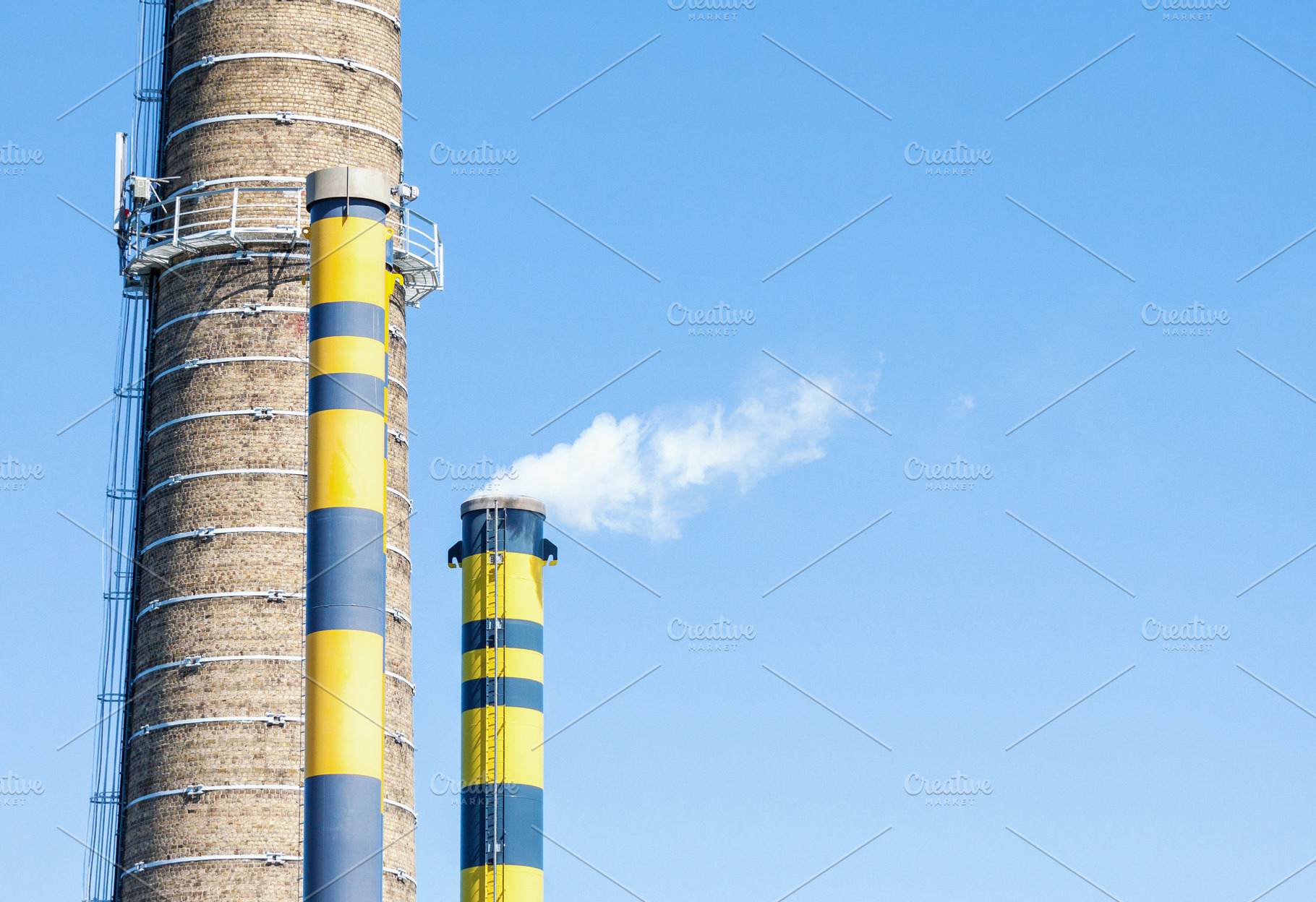 Industrial chimneys with smoke, an Industrial Photo by BOOCYS