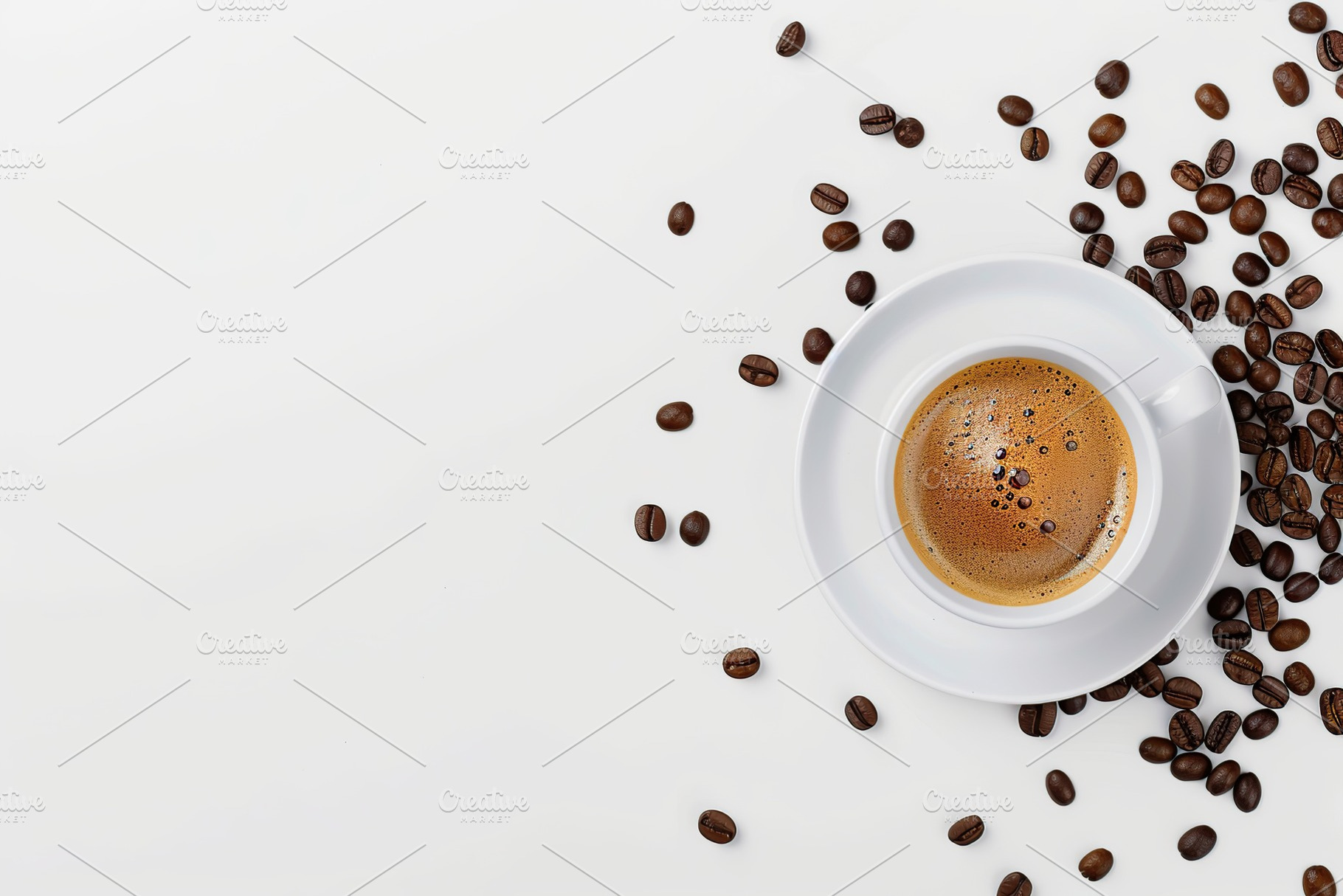 Flat lay of cup of coffee and coffee beans on white background, a Food & Drink Photo by AlyaAnd