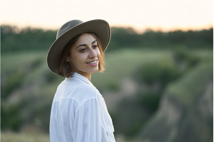 Pretty young woman Enjoying Nature, a Person Photo by vitaliymateha photography