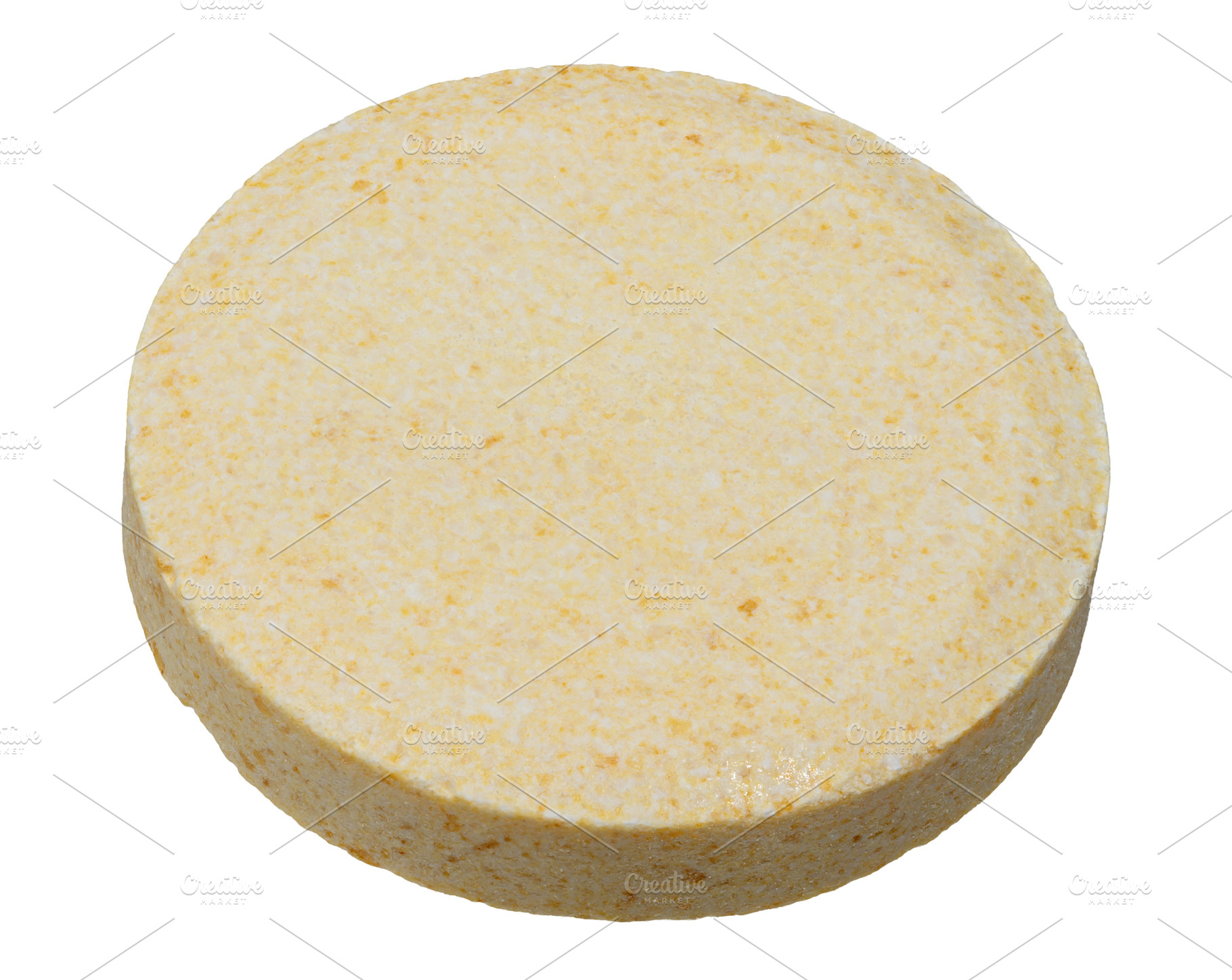 A round, flat, light yellow tablet with specks on an isolated ba, a Health & Medical Photo by ndanko