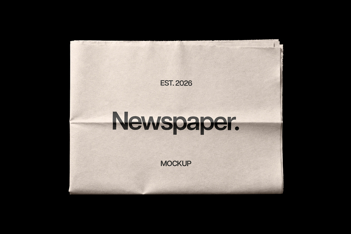 Newspaper Mockup, a Books & Magazine Mockup by Design Squad (Photo 1 of 5)