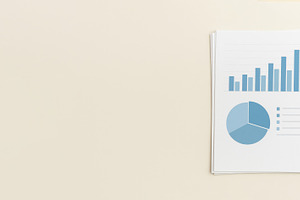 Business concept with graph and chart on paper, banner backgroun, a Photo by Dvoevnore photos