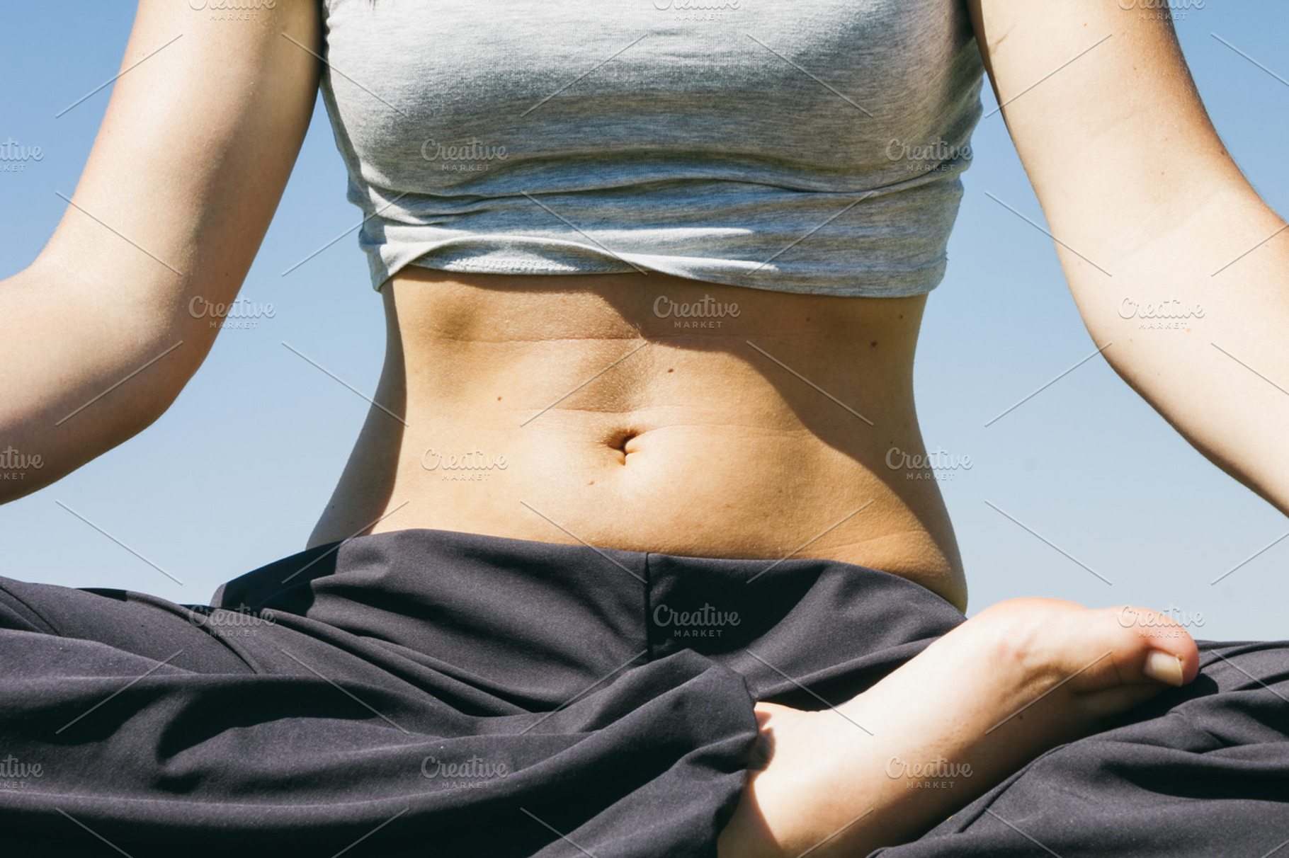 Abdomen of a woman doing yoga stock photo containing abdomen and woman, a Sports & Recreation Photo by Am.Benitez Estudio