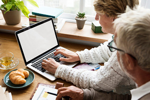 Elderly using computer laptop featuring blank, book, and break, a Person Photo by rawpixel